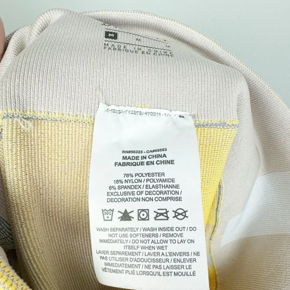 NIKE | Dri Fit Sculpt Icon Clash Cropped Leggings Yellow Gray Tan Women’s Size M